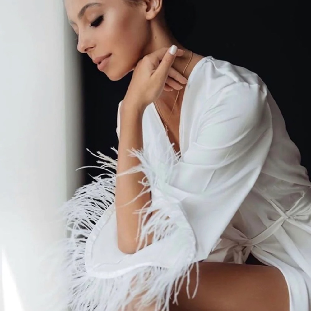 White bridal robe with feathers